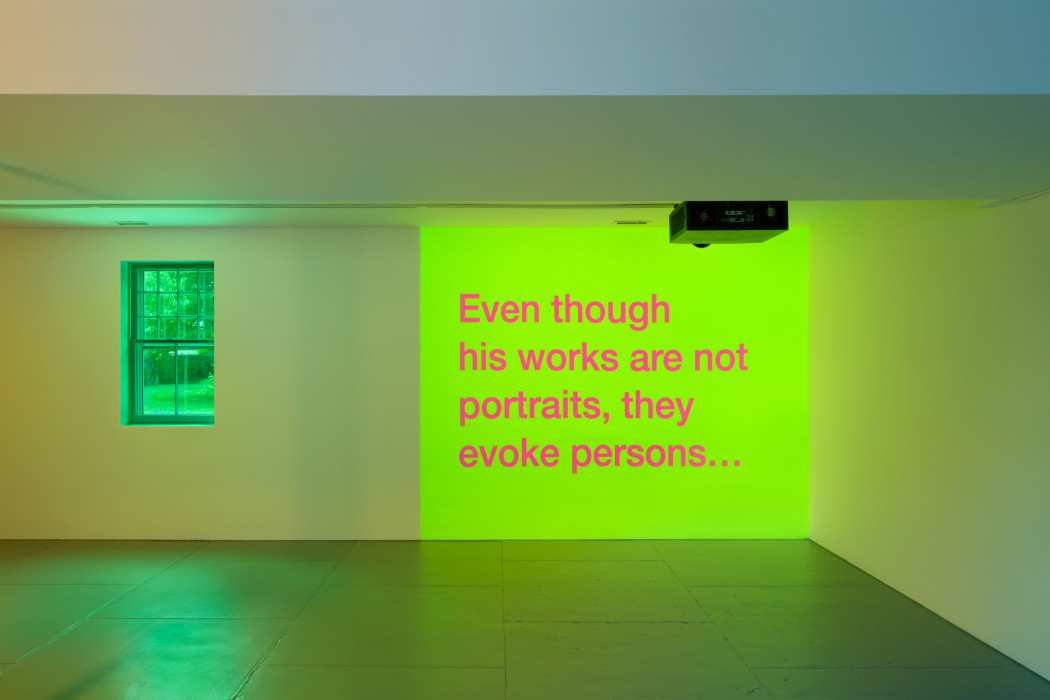 A bright green rectangle with red text reads 